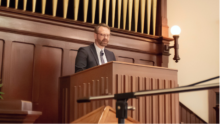 Pastor preaching from the pulpit during worship