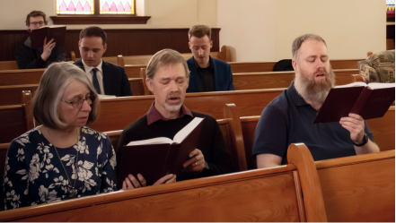 Congregation singing psalms and hymns together